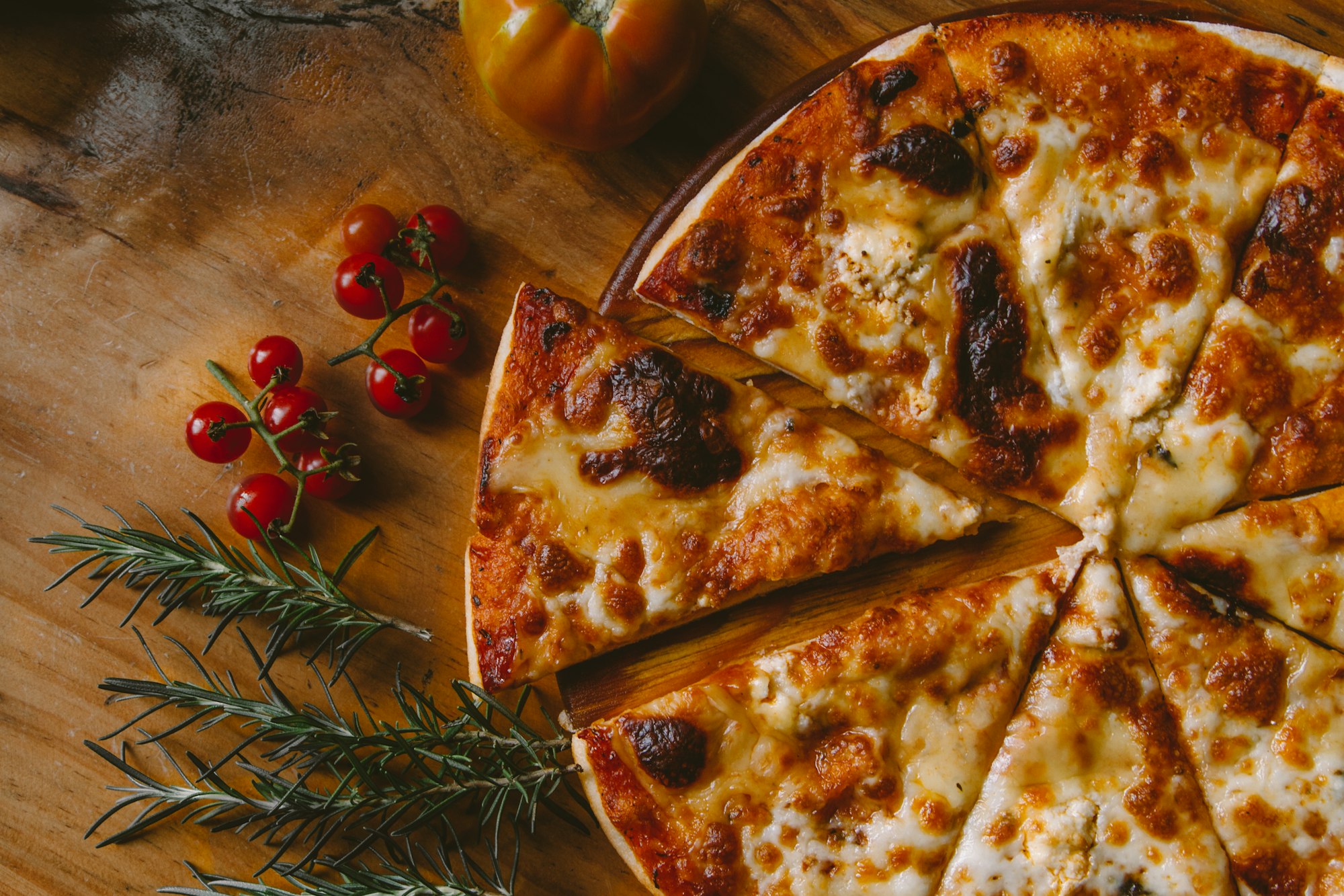 A pizza baked until the crust is blistered.